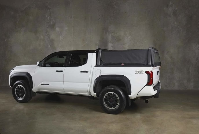 Toyota Tacoma with MOTU truck cap for carrying gear
